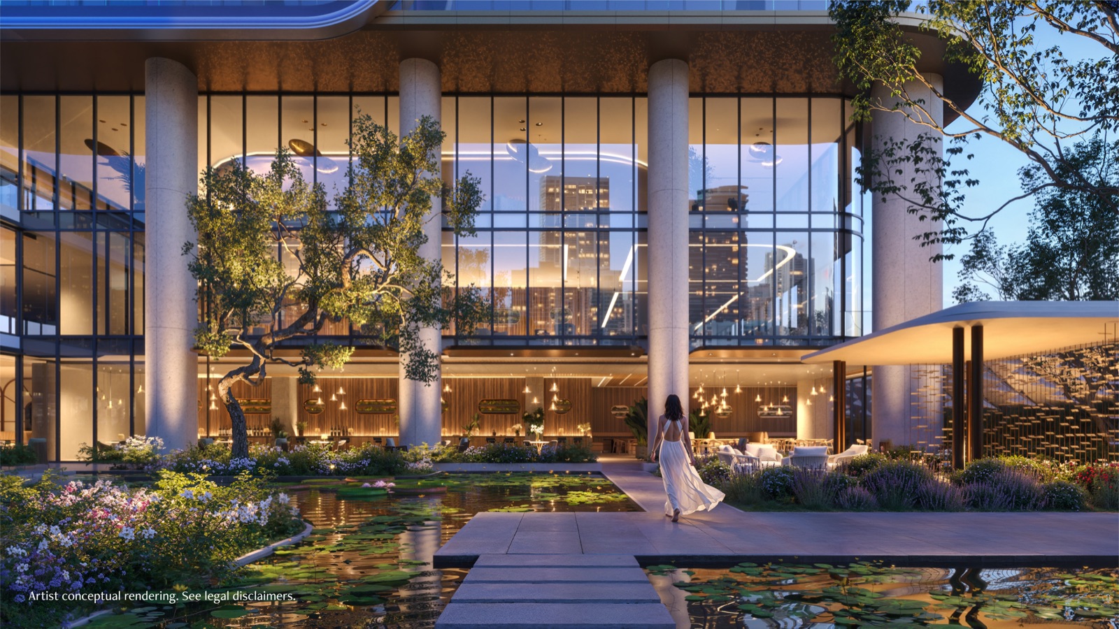 The outdoor amenity terrace at Anantara Residences Miami at dusk — softly lit cabanas, fire features, and lounge seating set among tropical gardens above Biscayne Bay.